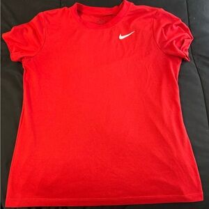 Red “Women's Nike Dri-FIT Tee” size medium